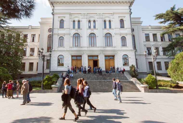 Students walking past main building of the Tbilisi State University, established 1918